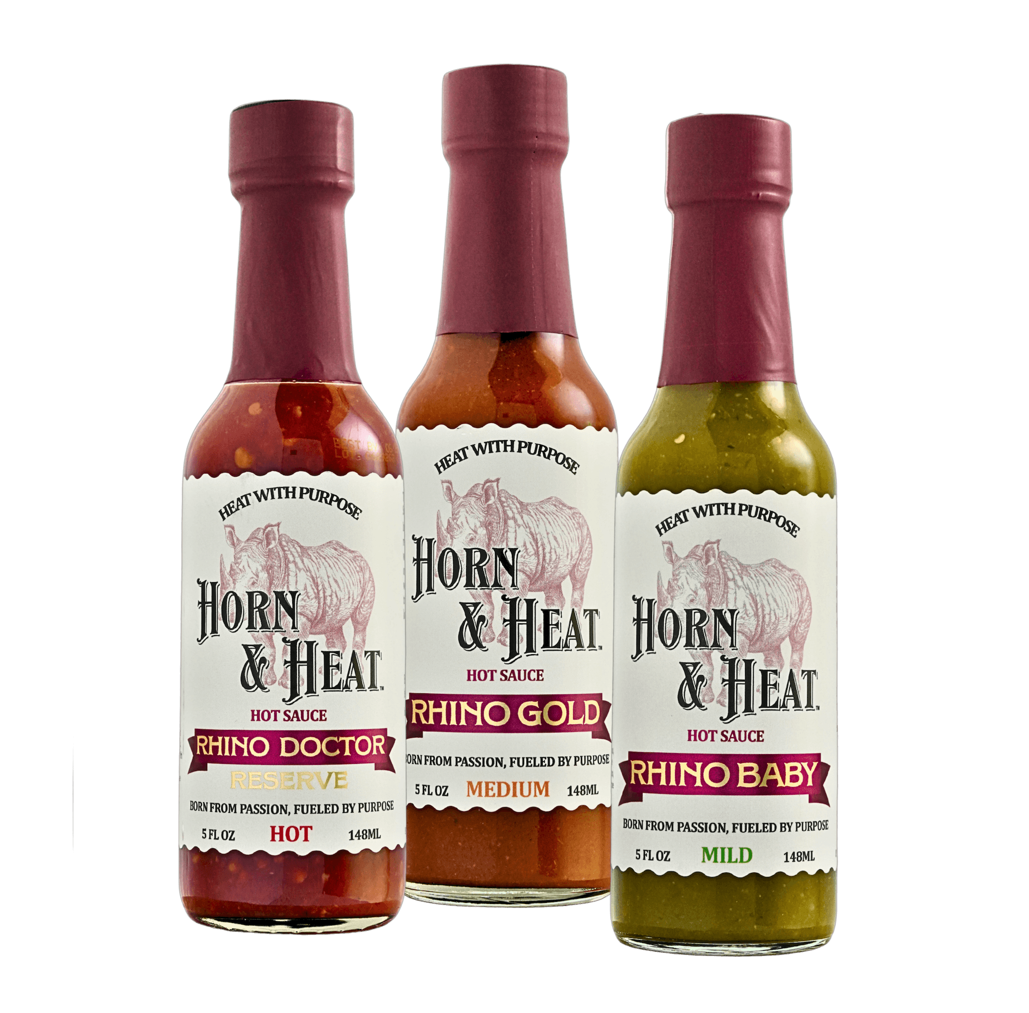 Horn & Heat Hot Sauce Trio featuring Rhino Doctor Reserve, Rhino Gold, and Rhino Baby bottles.